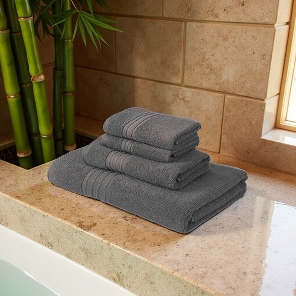 Blossoms 4 pc grey colour Towel set . |1 PC Bath Towel | 1 PC hand Towel| | 2 pcs Face Towel| |100% pure cotton|.