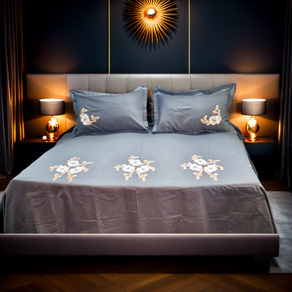 Blossoms Designer embroidered floral pattern bedcover.