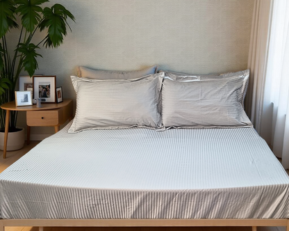 Blossoms 600 thread count premium satin stripes king size bedsheet with 2 pillows .