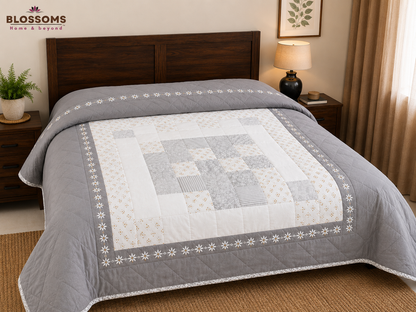 Blossoms Block patchwork quilt cum bedcover with embroidery .