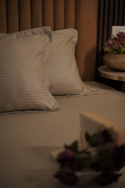 Blossoms 600 thread count premium satin stripes king size bedsheet with 2 pillows .