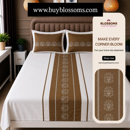 Blossoms embroidered designer bedsheet with 2 pillows .