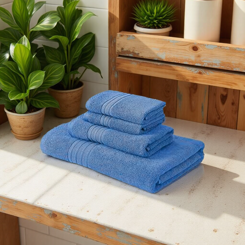 Blossoms 4 pc Blue colour Towel set . |1 PC Bath Towel | 1 PC hand Towel| | 2 pc Face Towel| |100% pure cotton|.