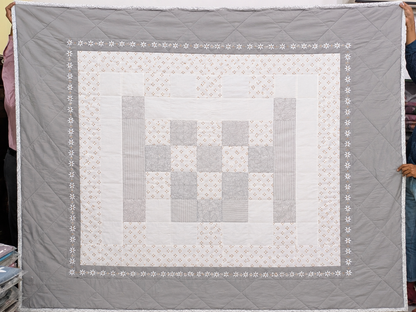 Blossoms Block patchwork quilt cum bedcover with embroidery .