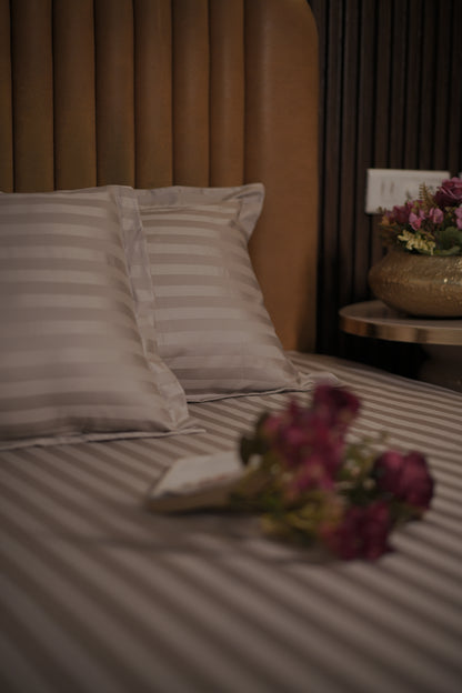 Blossoms 600 thread count premium satin stripes king size bedsheet with 2 pillows . Pure cotton.