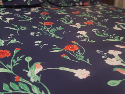 Blossoms blue Printed double bed king size bedsheet with 2 pillows.