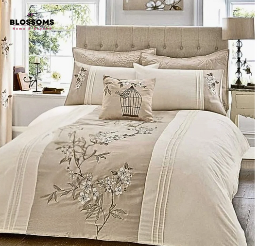 Blossoms designer quilted Bedspread with floral embroidery , and pintex work ,| 2 designer pillows | |1 cushion cover with filler|  |Set of 4 pcs |.